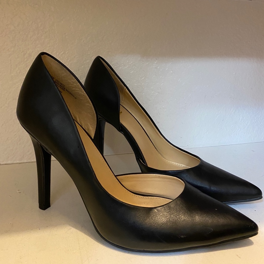 Pointy black stiletto heels